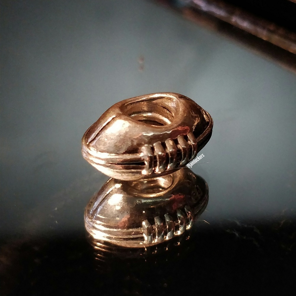 Football charm, Pandora retired